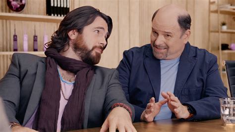 Jason Alexander did not look happy to be seen with a Nintendo .